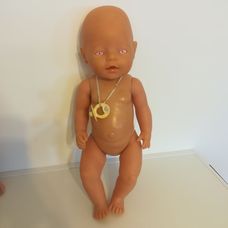 Zapf Baby Born rózsaszín szemű pisilős baba cumival