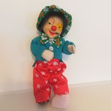 Szépséghibás porcelán arcú bohóc figura