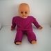 50 centis retro élethű csecsemő baba lila ruhában