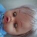 50 centis Cicciobello szőke hajú baba kék rugdalózóban