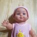 Munecas Arias csecsemő baba rózsaszín ruhában