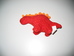 Szédült dinoszaurusz piros plüss állatka