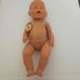 Zapf Baby Born rózsaszín szemű pisilős baba cumival