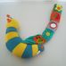 Early Years zenélő készségfejlesztő plüss csiga