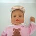 Sum Sum interaktív csecsemő baba kutyás rugdalózóban
