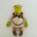 Plüss Shrek figura mikulássapkában