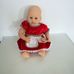 Zapf Baby Annabell interaktív csecsemő baba piros ruhában