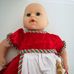 Zapf Baby Annabell interaktív csecsemő baba piros ruhában